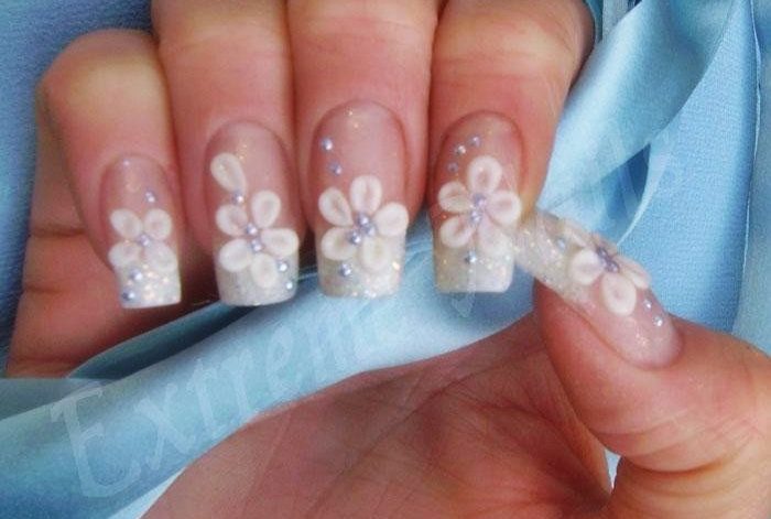 Elevate Your Look: The Rise of the "Fancy" French Manicure Trend This Summer